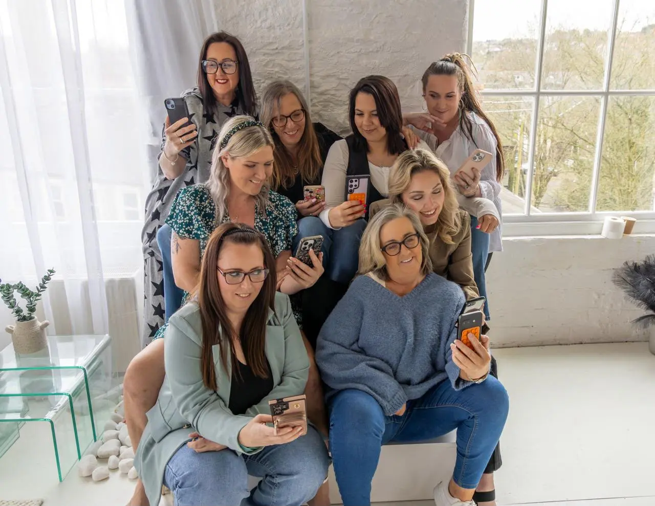 Digital Wealth Collective members gathered in a bright studio